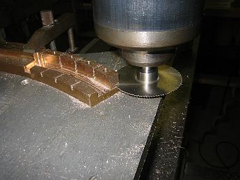  Using the slitting saw to cut the link blocks from the hunk of bronze stock.